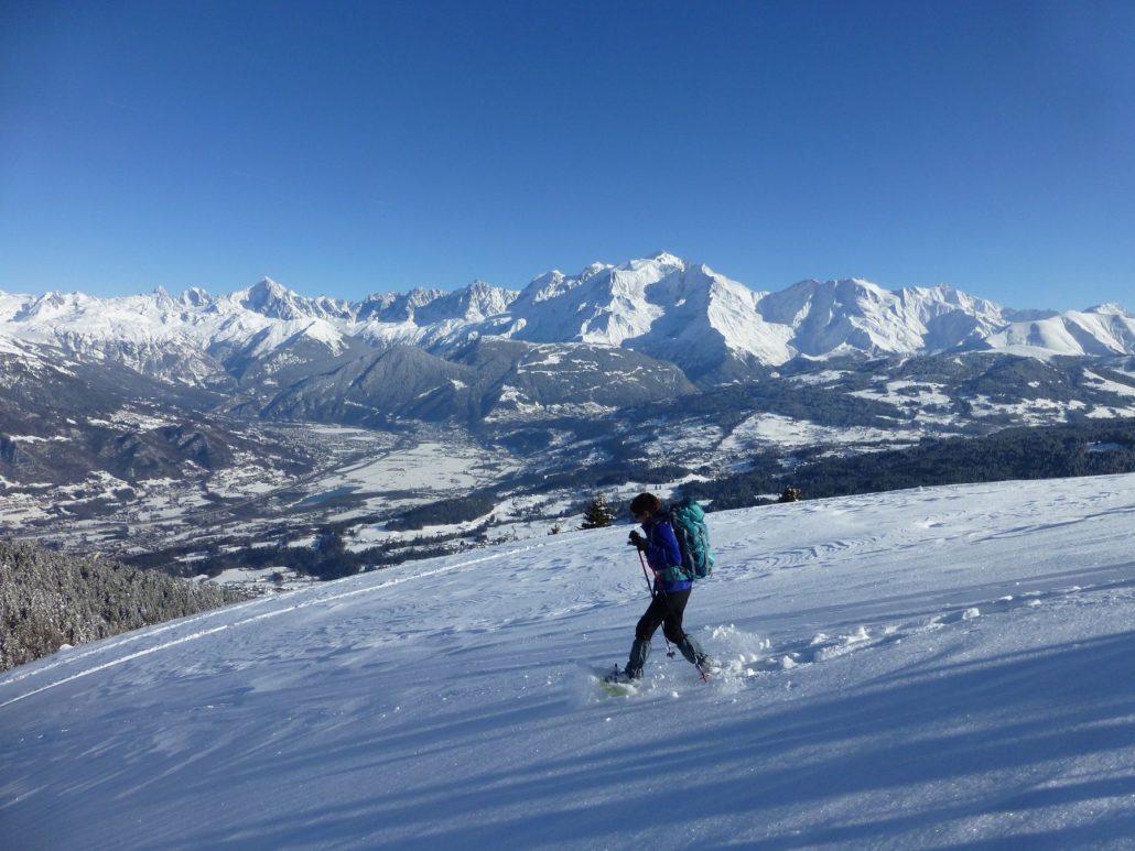 Snowshoeing in front of the Mont Blanc mountains